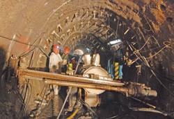 Drilling boreholes for grouting carried out from the exploration gallery; the Blanka Tunnels, Prague