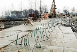 Grouting field for strengthening of overburden walls for driving an underground collector